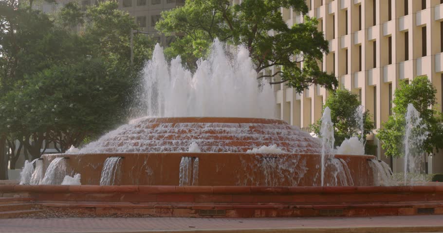 Establishing shot of a water fountain in downtown Houston, Texas