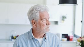 Pensive elderly mature senior man in eyeglasses looking in distance out of window, thinking of personal problems. Lost in thoughts elderly middle aged grandfather suffering from loneliness, copy space - Powered by Shutterstock - Get 15% off with code: PIKWIZARD15