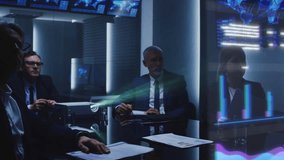 Business Professionals in a Meeting Room Analyze Financial Data Holograph Projected on Screen. Diverse Team Collaborates on Strategic Planning Using Digital Analytics, Charts, Graphis, Growth Visuals - Powered by Shutterstock - Get 15% off with code: PIKWIZARD15
