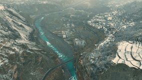 Cinematic Drone footage of the Beautiful Valley and mountain in Karimabad Hunza Northern Pakistan during snow