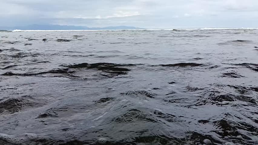 Waves in the ocean as background. slow motion shot.