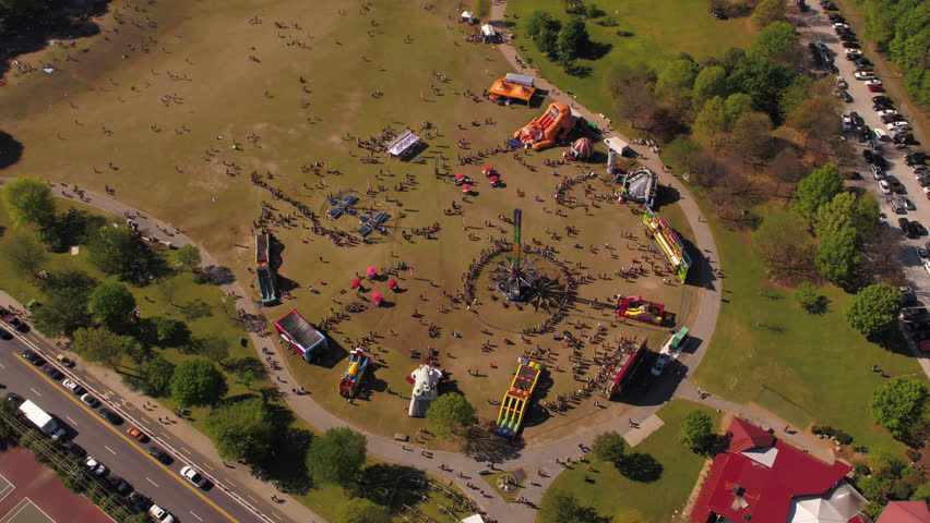 Atlanta Aerial v256 Flying over Piedmont park panning up and over with cityscape views - April 2017