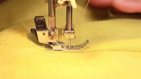 The process of sewing fabric on a sewing machine, The sewing machine needle in motion close-up - Powered by Shutterstock - Get 15% off with code: PIKWIZARD15