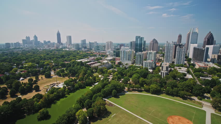Atlanta Aerial v320 Flying low over Piedmont Park sunny full cityscape - September 2017