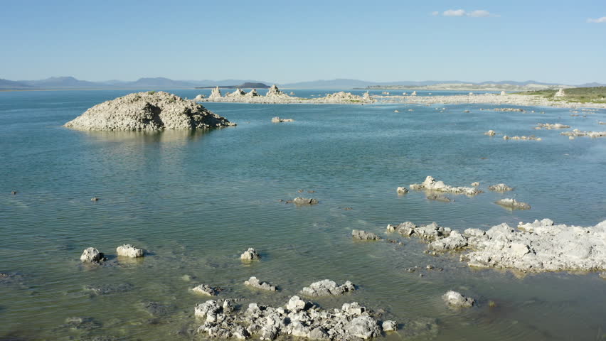 Hovering above Mono Lake with tufa formations in water, located in California, USA.