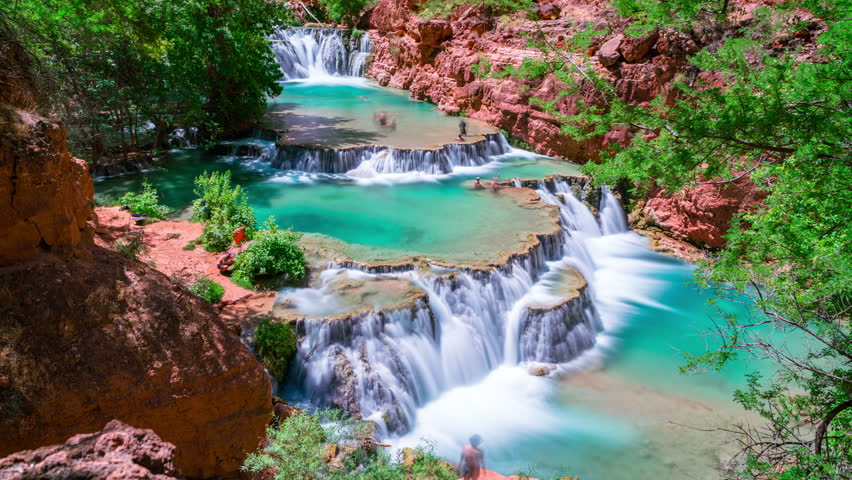 Timelapse long exposure shot of sunlight revealing magnificent terrace waterfalls in Grand Canyon in Arizona, USA