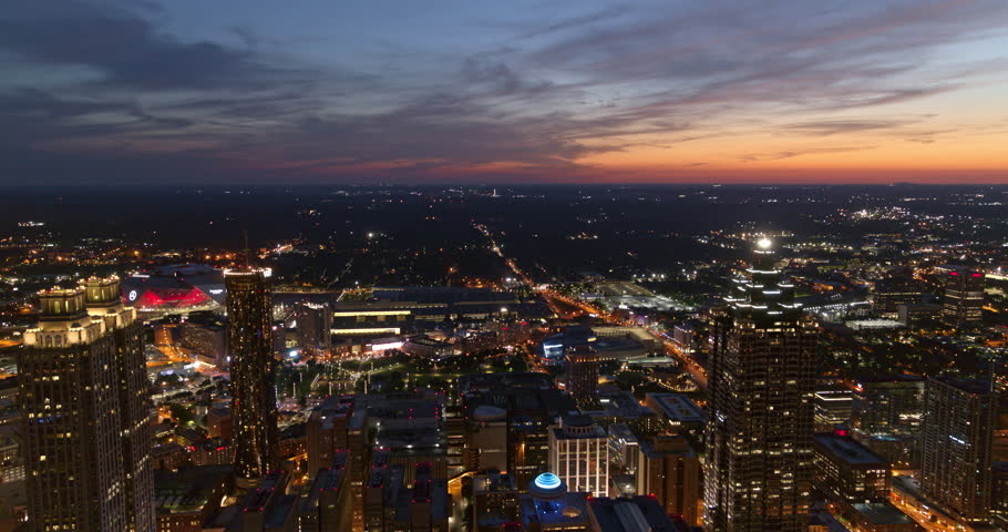 Atlanta Aerial v373 Panning around looking over downtown cityscape at dusk - June 2018
