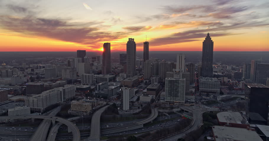 Atlanta Aerial v375 Flying, crossing over downtown cityscape sunset view - January 2018