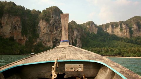 Thai boat - longtail floats to the coast