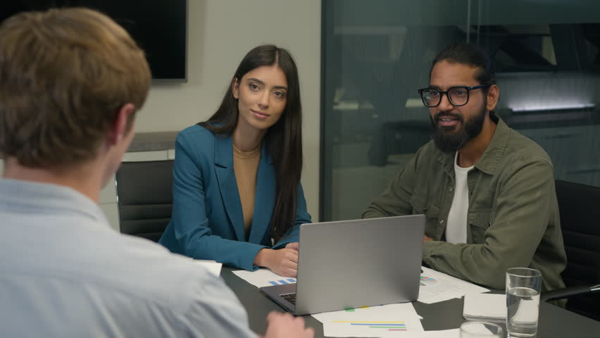 Business corporate meeting recruitment at office Arabian Indian Caucasian male female businessman businesswoman colleagues man woman listen speaker at workplace consultation interview hire candidate