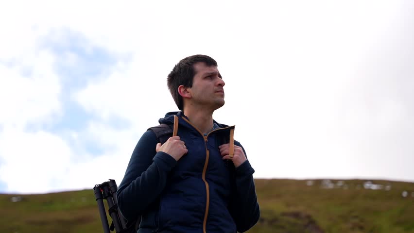 Hiker enjoying the view in the Welsh countryside in Brecon Beacons National Park