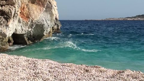 view on the sea, rock, an island and pebble on Kaputas beach, natural sounds