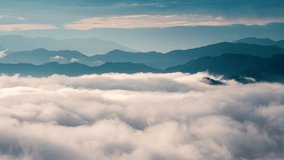 Before sunrise, the unpredictable sea of ​​clouds is like turbulent waves. View of the mountains surrounding Emerald Reservoir. Xindian District, Taiwan. - Powered by Shutterstock - Get 15% off with code: PIKWIZARD15
