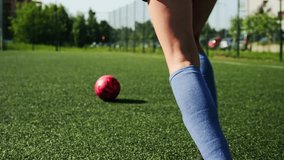 Small Girl Bouncing A Soccer Ball On A Field, From Behind - Powered by Shutterstock - Get 15% off with code: PIKWIZARD15