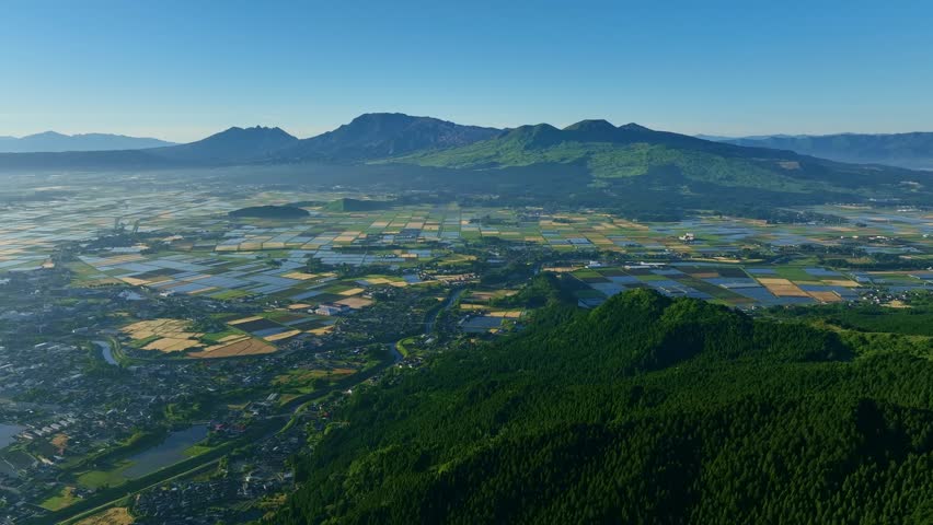 Aerial drone view of the spectacular landscape of Garden City lined with rice fields.