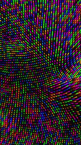 Colorful background with lot of small dots in the center. Vertical looped animation.