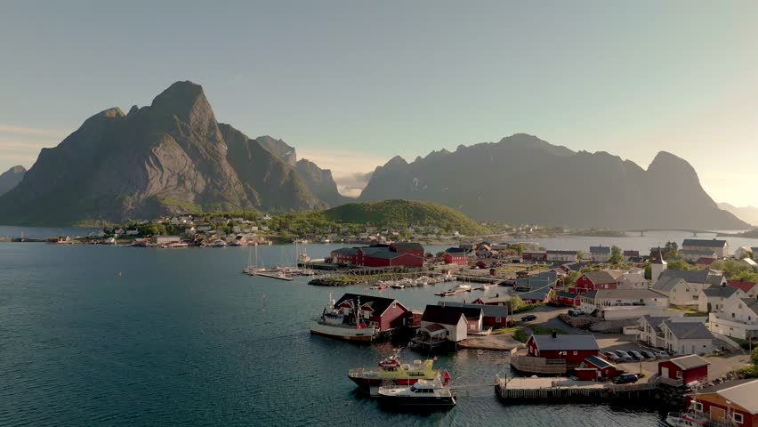 Lofoten Islands Norway in the morning, Reine village on the water of the fjord in the Lofoten Islands, Norway, Lofoten Islands in summer