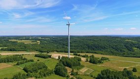 drone aerial view of windmill turbines generating green energy electric. wind farm generating green energy