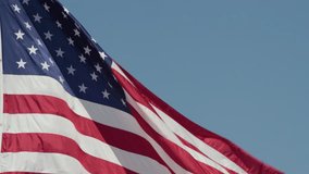 Close Up of American Flag Waving in The Wind - Powered by Shutterstock - Get 15% off with code: PIKWIZARD15