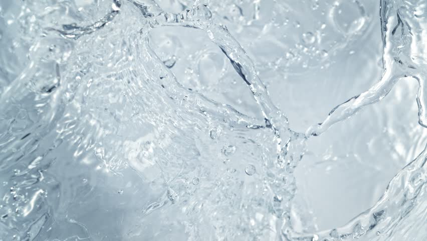 Super Slow Motion Shot of Pure Water Followed by Camera Splashing into Surface at 1000fps.