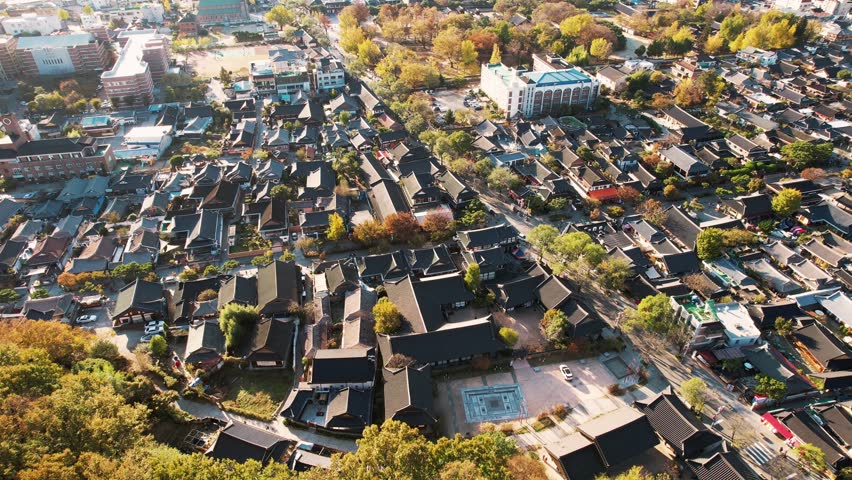 Jeonju Hanok Village, a serene tapestry of traditional Korean architecture nestled among modernity, a testament to cultural preservation and architectural harmony.