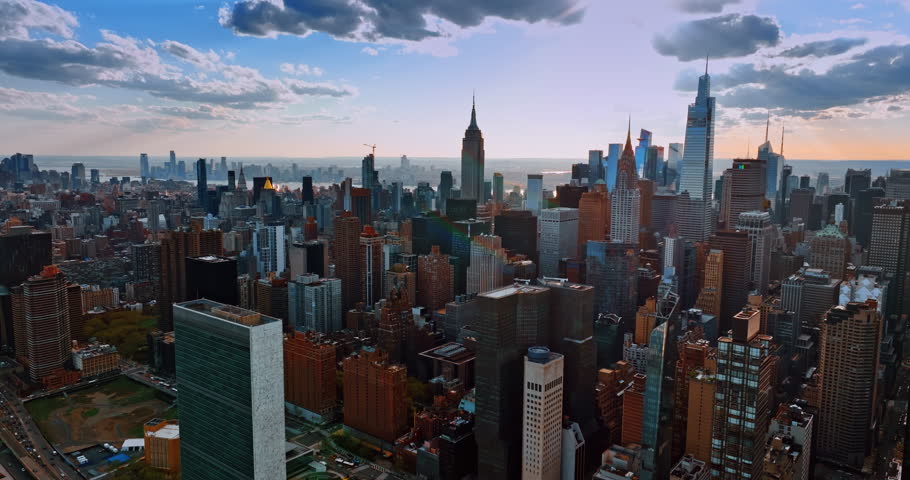 Rising above the splendid scenery of New York, USA. Panorama of the city after sunset.