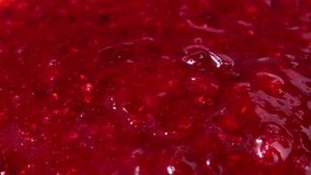 Bright red cranberry sauce pouring down close up - Powered by Shutterstock - Get 15% off with code: PIKWIZARD15