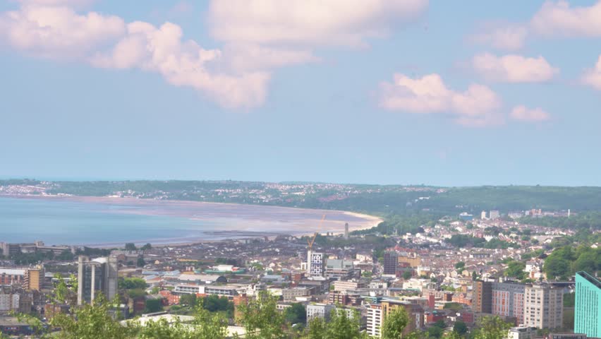 Timelapse View of Swansea City from Hill Top on Hot Sunny Day with Clouds