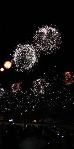 Fireworks on New Year's Eve in Rio de Janeiro, Copacabana Beach, vertical video
