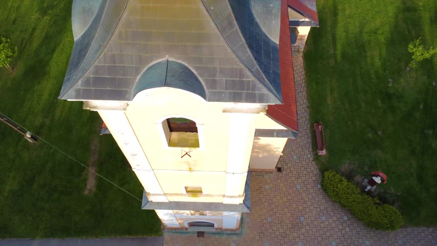 Catholic Church Of The Holy Spirit In Kormend, Vas County, Hungary. slow FPV drone