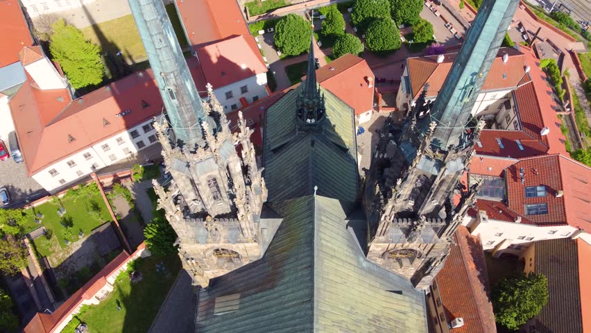 Majestic towers of Brno cathedral, aerial drone close fly by
