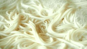 Boiling  instant noodles in pan, in door Chiangmai Thailand. - Powered by Shutterstock - Get 15% off with code: PIKWIZARD15