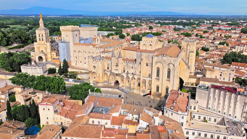 Aerial view of the largest and most important medieval Gothic buildings in Europe. Historical landmark Palais des Papes in Avignon, Southern France.