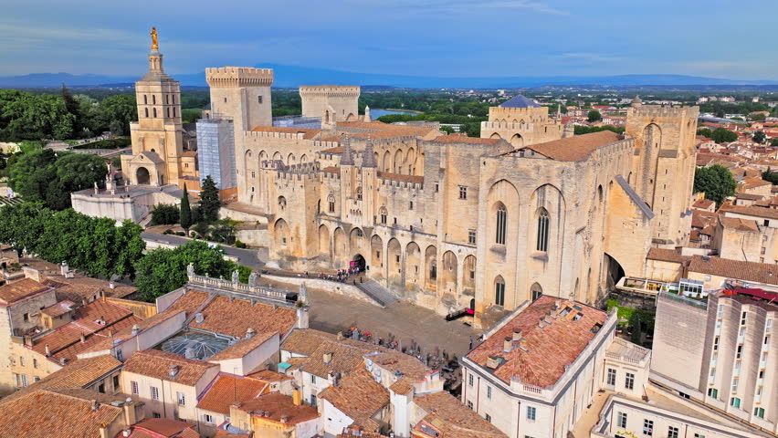 Aerial view of the largest and most important medieval Gothic buildings in Europe. Historical landmark Palais des Papes in Avignon, Southern France.