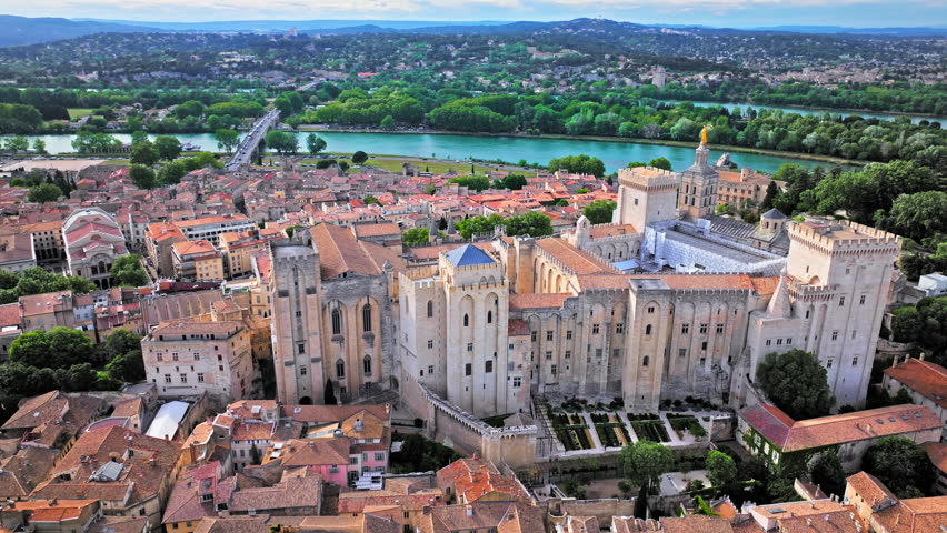 Aerial view of the largest and most important medieval Gothic buildings in Europe. Historical landmark Palais des Papes in Avignon, Southern France.