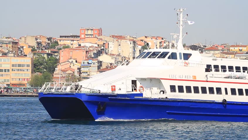 ISTANBUL - APR 28: High speed ferryboat ULUC ALI REIS sails out from Kadikoy