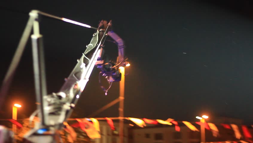 Jimmy Jib Crane Camera in action at night concert
