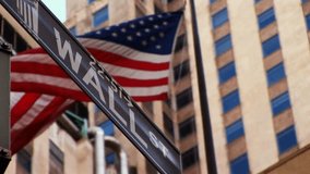 business background Wall Street sign in lower Manhattan New York, USA with american flag us states concept Wall street corner Broad - Powered by Shutterstock - Get 15% off with code: PIKWIZARD15
