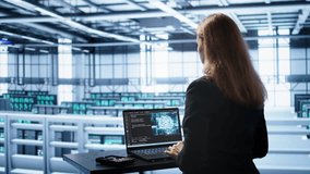 Engineer in data center using artificial intelligence computing simulating human brain thought processes in computerized model. Employee works on laptop with AI machine learning algorithms, camera B - Powered by Shutterstock - Get 15% off with code: PIKWIZARD15