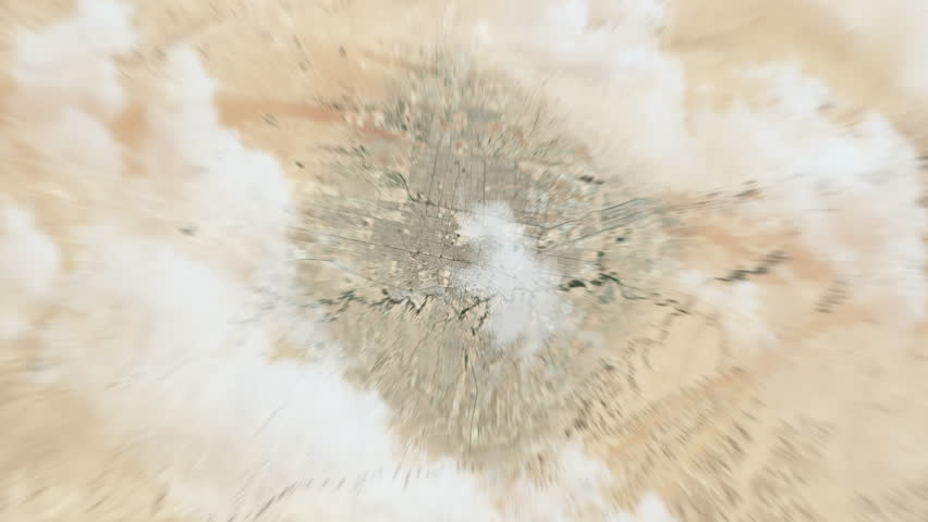 Zooming on Riyadh, Saudi Arabia. Earth zoom in from outer space to city. The animation continues by zoom out through clouds and atmosphere into space. View of the Earth at night. Images from NASA. 4K