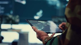 Special operations engineer following enemy warships or submarines to ensure safety within national territory. Navy IT specialist protecting the coast from hostile vessels. Close up. Camera B. - Powered by Shutterstock - Get 15% off with code: PIKWIZARD15