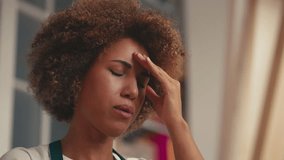 Young woman artist working on a picture, upset with result, lack of inspiration - Powered by Shutterstock - Get 15% off with code: PIKWIZARD15