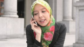 Scarf girl with braces teeth use cellphone 