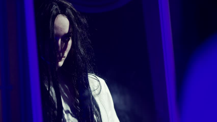 Creepy girl, looks in the mirror, contacts with the world of spirits