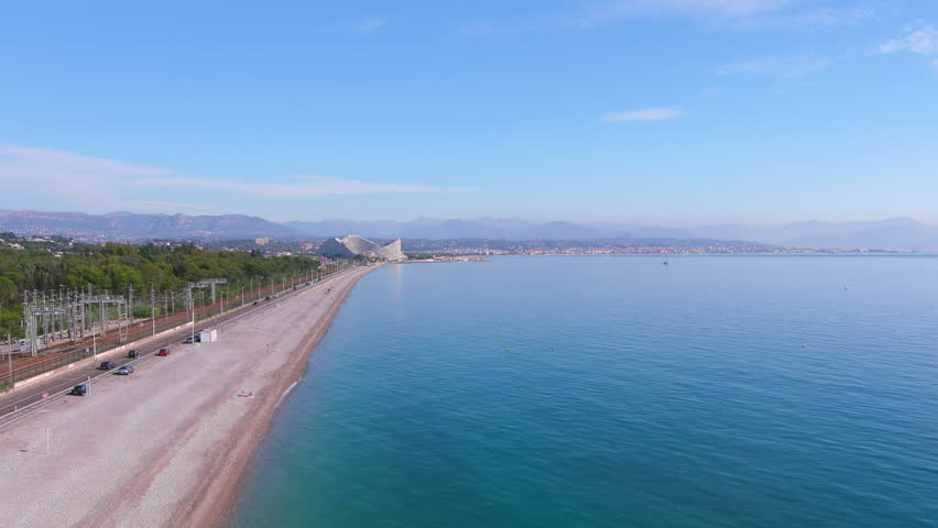 Nice, France: Aerial view of beach Plage de Vaugrenier in famous resort city by Mediterranean Sea on French Riviera - landscape panorama of Europe from above