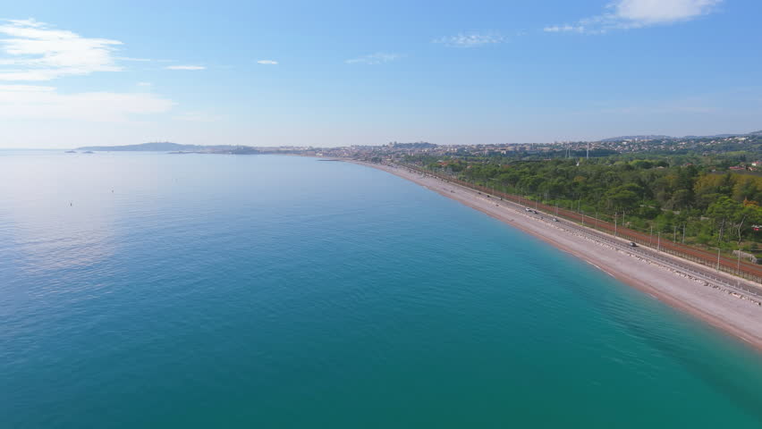 Nice, France: Aerial view of beach Plage de Vaugrenier in famous resort city by Mediterranean Sea on French Riviera - landscape panorama of Europe from above