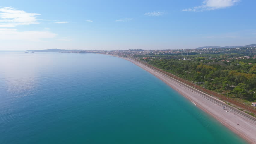 Nice, France: Aerial view of beach Plage de Vaugrenier in famous resort city by Mediterranean Sea on French Riviera - landscape panorama of Europe from above