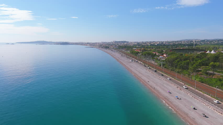 Nice, France: Aerial view of beach Plage de Vaugrenier in famous resort city by Mediterranean Sea on French Riviera - landscape panorama of Europe from above