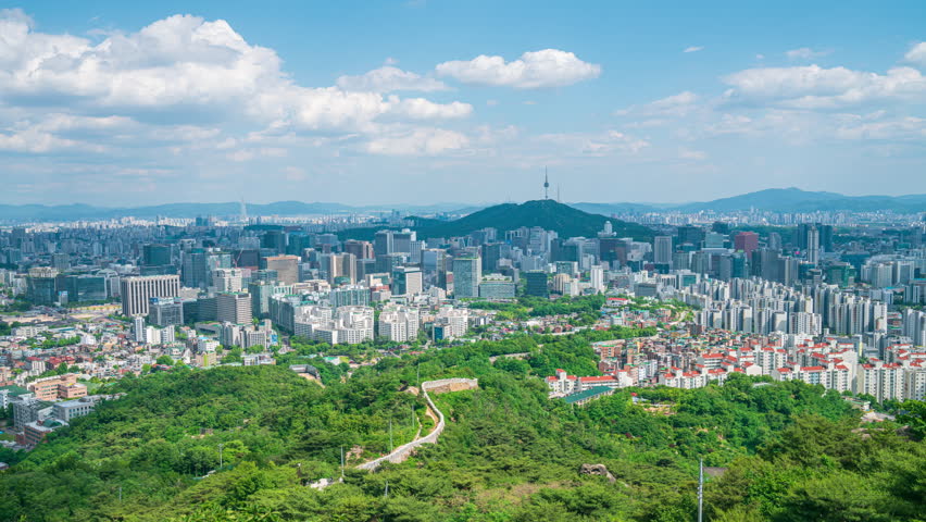 Time Lapse Video.Beautiful sky day, aerial view at Inwangsan Mountain.You can clearly see Seoul and Seoul Tower. South korea