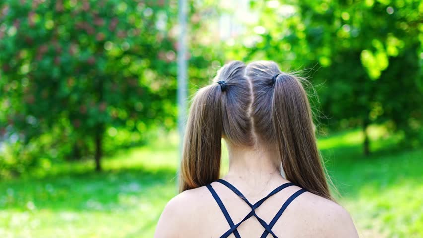 Young woman runner training in summer park. Close up fitness woman jogging outdoor. Morning running concept. High quality 4k footage